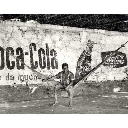 Man on Hammock in Front of Coca-Cola Wall, Oaxaca, Mexico