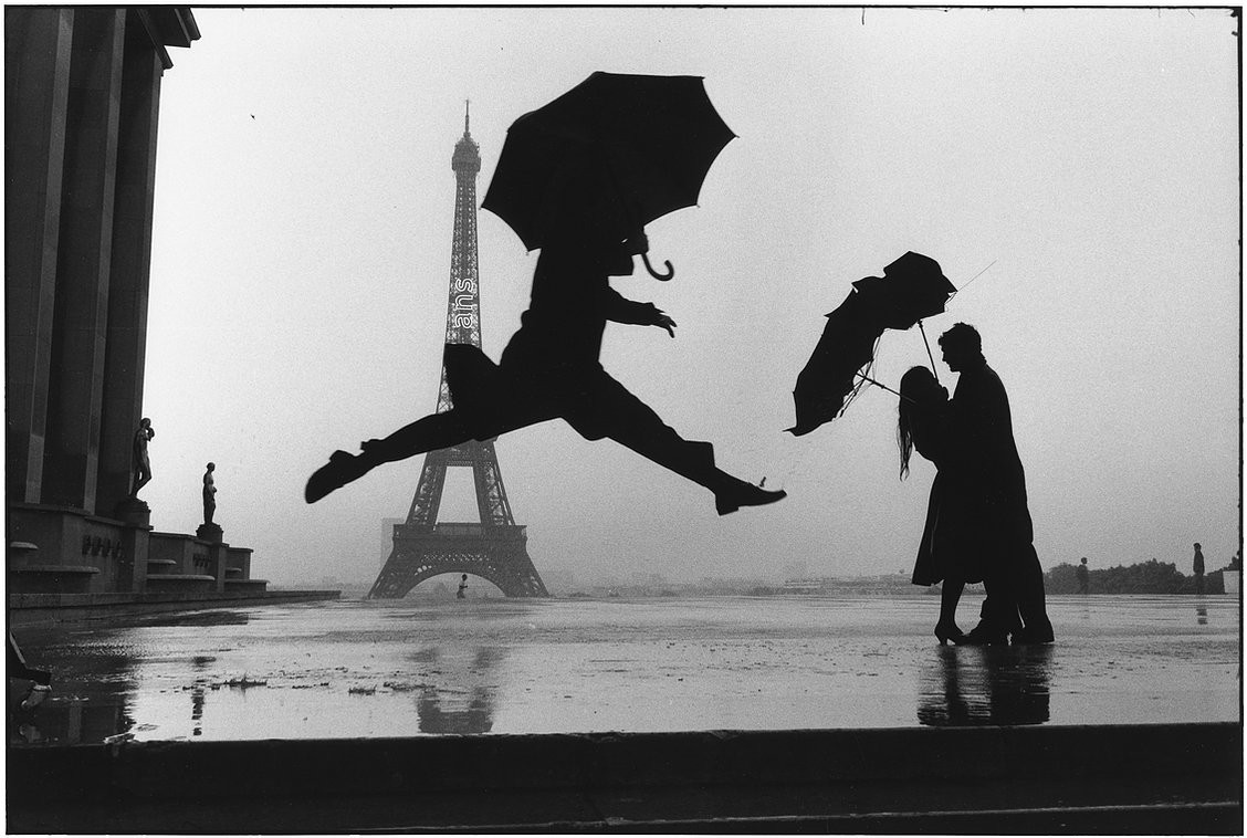 Paris, France (Three People and Umbrellas)