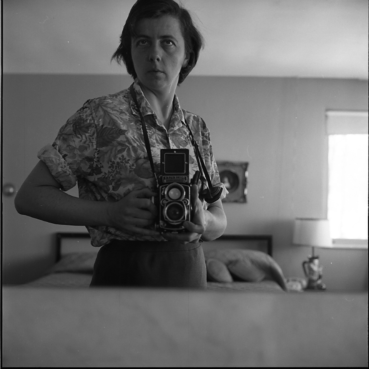 Vivian Maier, Self-Portrait, Bedroom Mirror, Highland Park, IL, January 1965