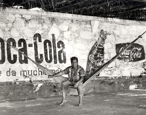 Man on Hammock in Front of Coca-Cola Wall, Oaxaca, Mexico
